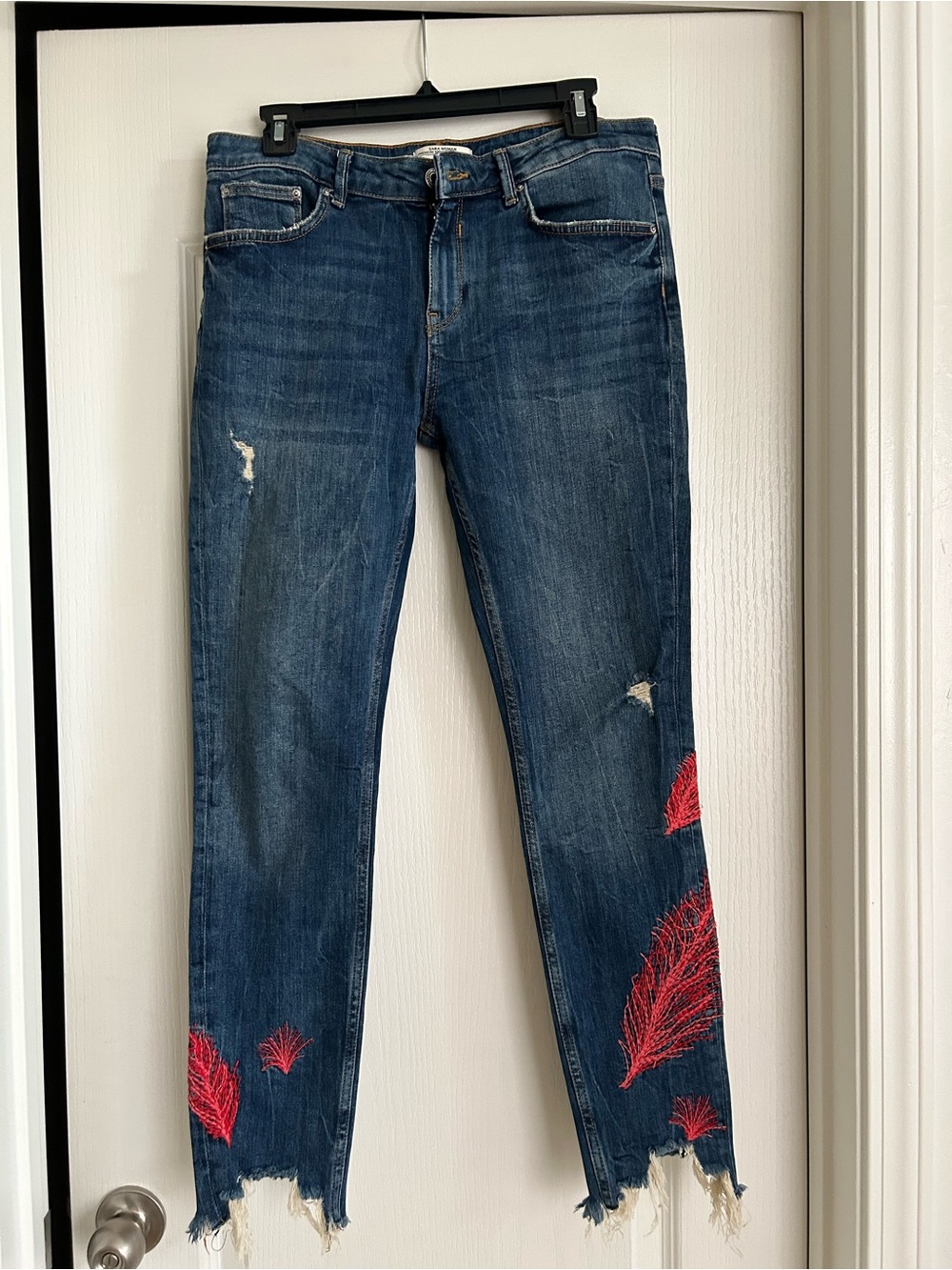 Women’s Distressed Dark Blue Jeans with Red Embroidered Detail